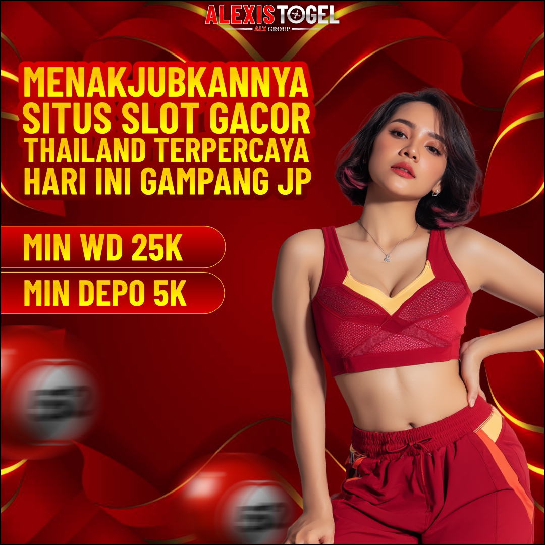 Man wearing a gray tank top with a design on the back, standing outdoors View 2